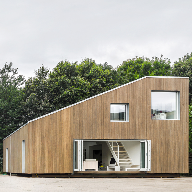 The WFH House, made from shipping containers features a mono sloped roof.