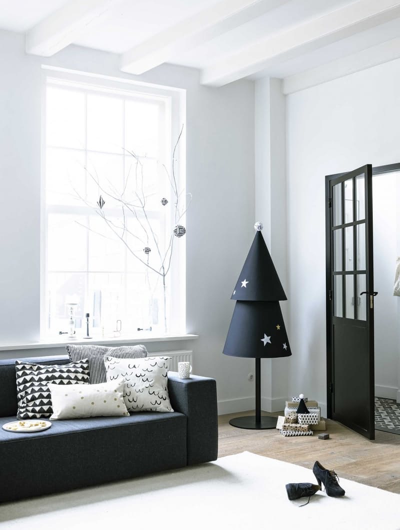 Love this minimalist Christmas tree seen on Apartment Therapy made from two large cone shapes. It's pretty easy to do.