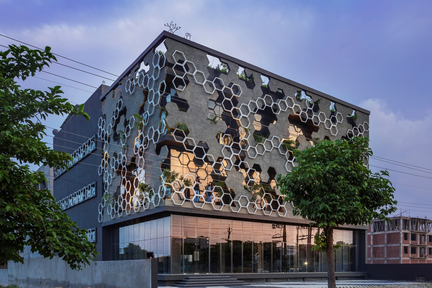 Hexalace Office Building by Studio Ardete features a hexagonal patterned  facade - Livin Spaces