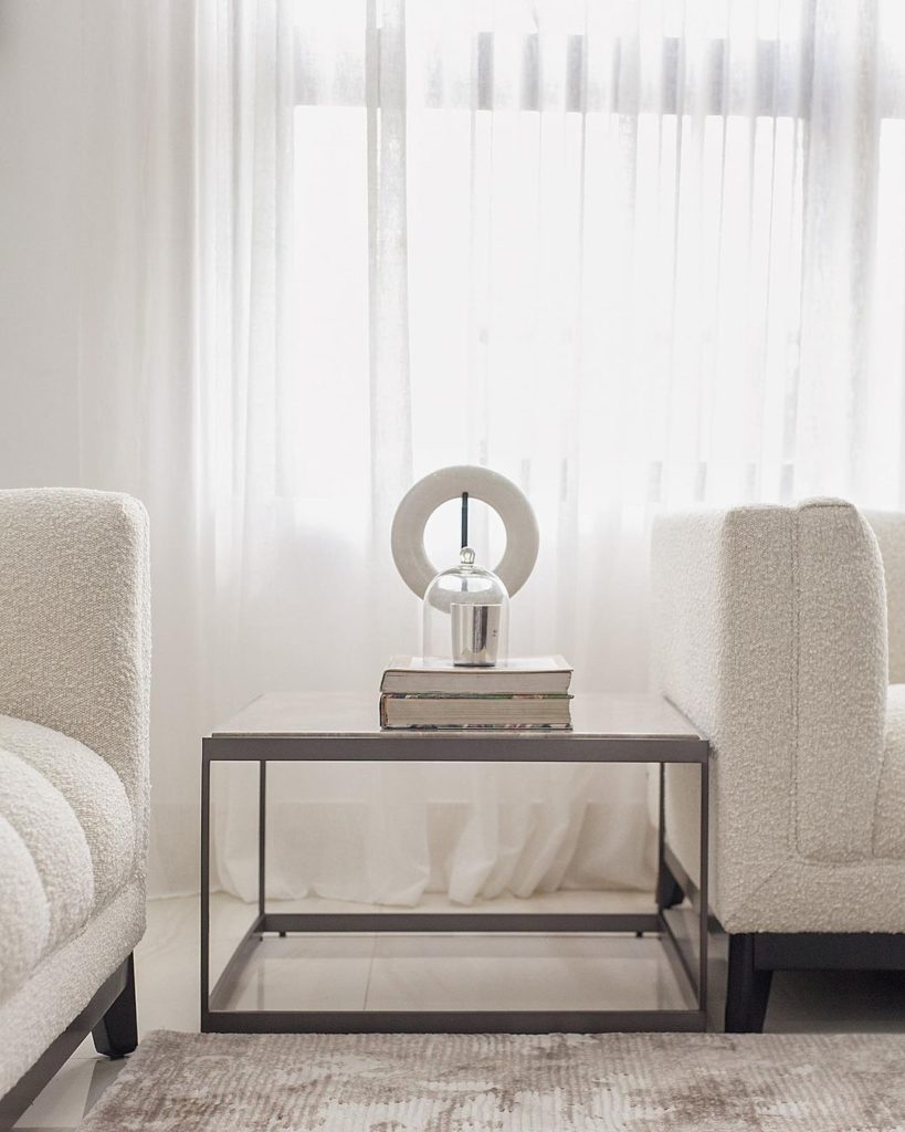 Side table with luxury living room decor in ikoyi home by Urban Living