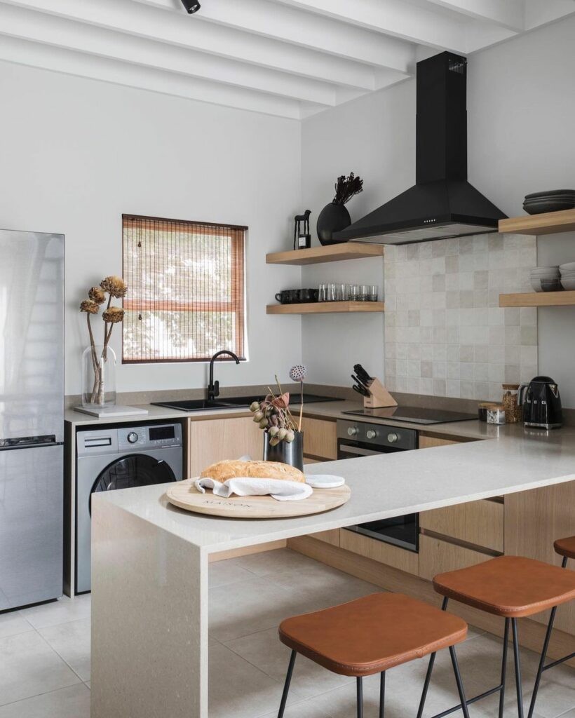 After image of kitchen in modern apartment renovation by Weylandts Studio