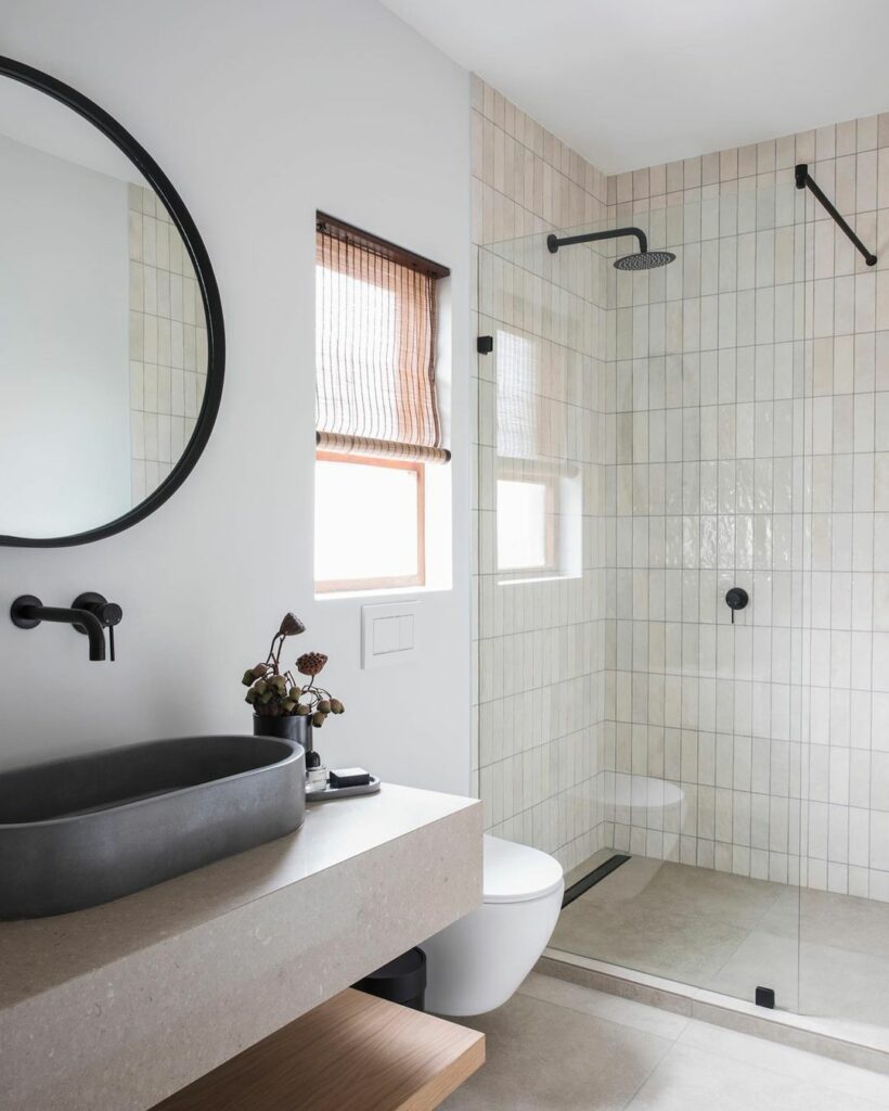 After image of bathroom in modern apartment renovation by Weylandts Studio