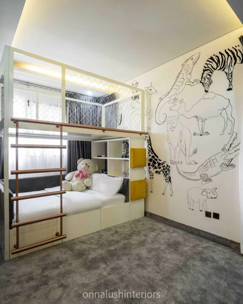 Fort bed and animal wall mural in boy's bedroom   by Onnalush Interiors