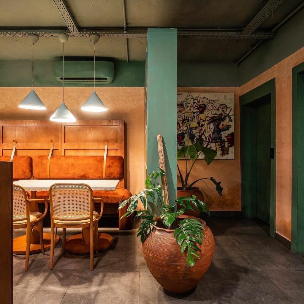 A view of the Cafe area in the Eclectic Retro-Industrial Restaurant by S.EA Consulting
