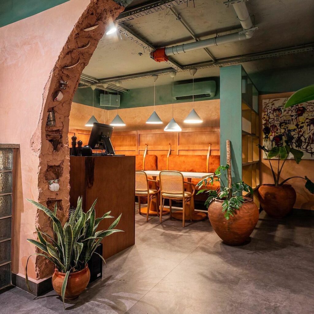 The archway in the Eclectic Retro-Industrial Restaurant by S.EA Consulting