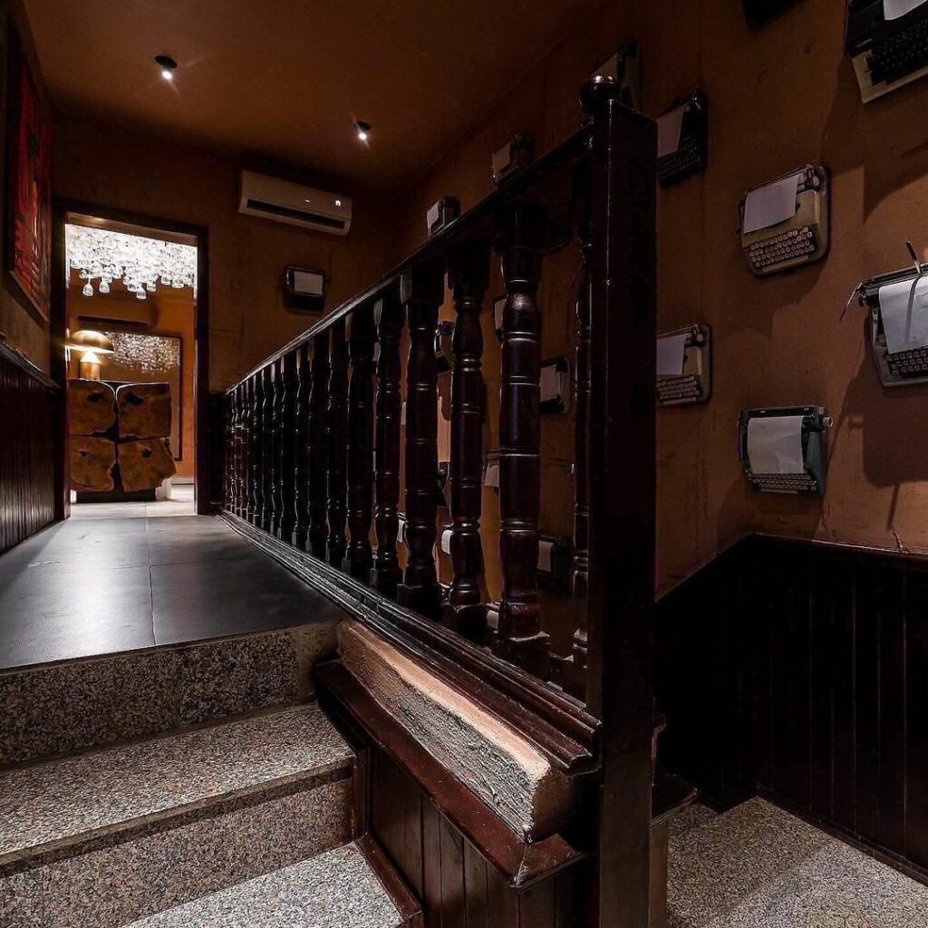 Typewriters used to decorate the stair hall in the Eclectic Retro-Industrial Restaurant by S.EA Consulting