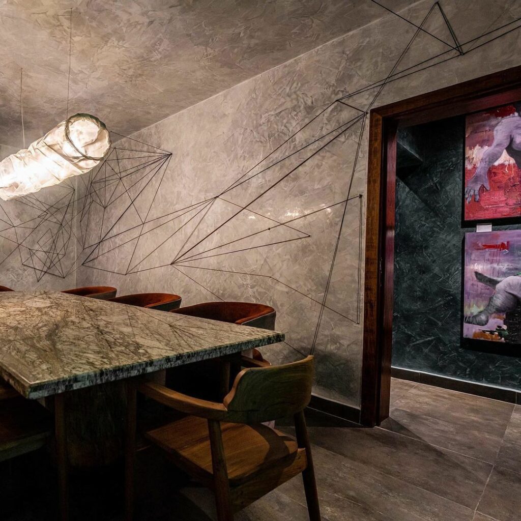 Image of the lounge area in the Eclectic Retro-Industrial Restaurant by S.EA Consulting