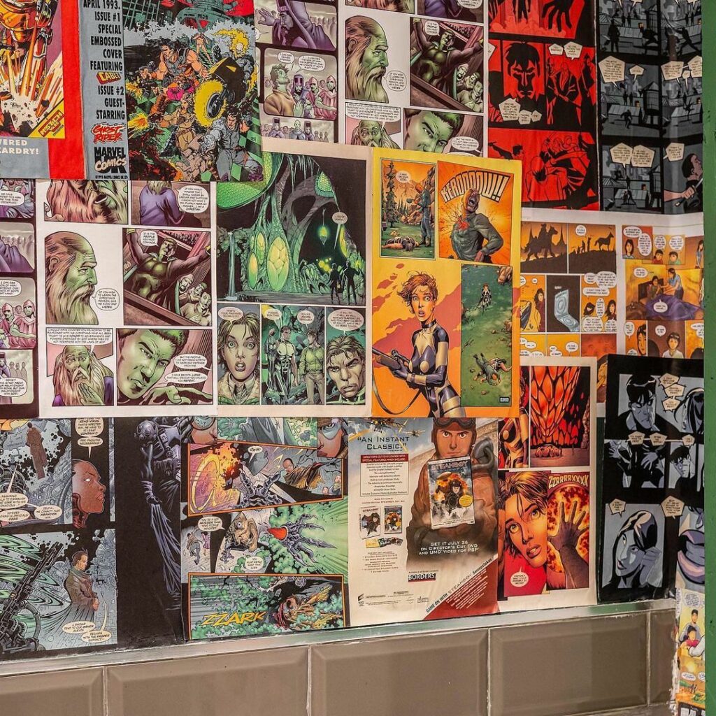 Comic book strips used to decorate bathroom wall in SEE Restaurant by S.EA Consulting