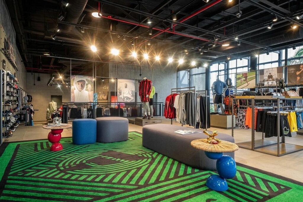 Seating area in Adidas flagship store design by Teal Harmony Designs