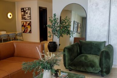 View of sofas in Nordic Interior Design of Airbnb Apartment by Interior Culture by Obiageli