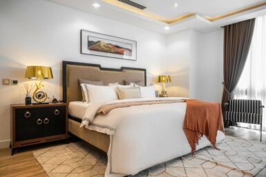 Tangerine-Infused Contemporary Bedroom Design by Maison Consulting
