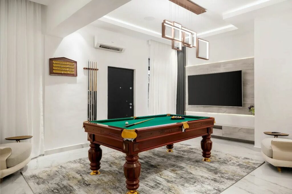 Gaming area - Modish Art Deco Living room By Infinite Construction