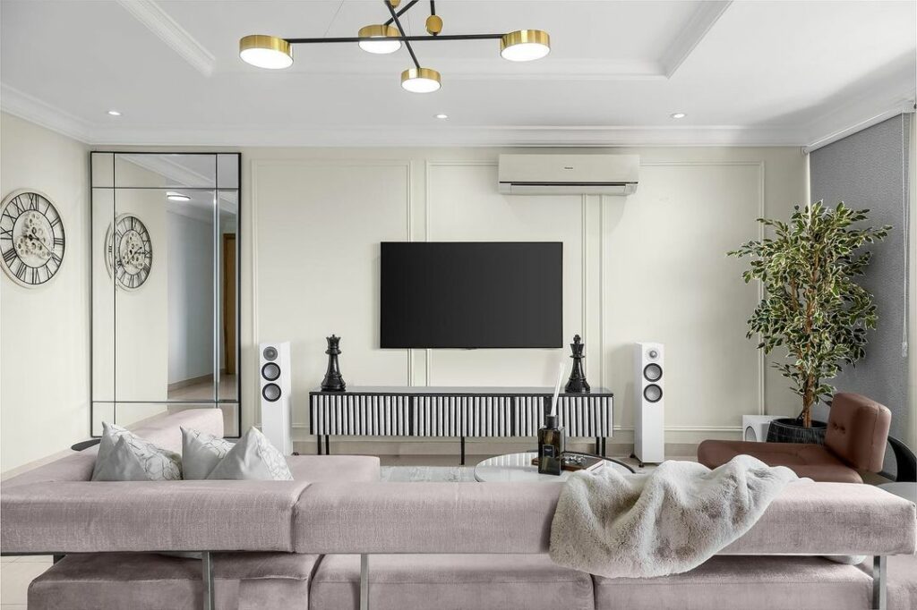 Wall panel in Jayvane Interior's Trendy Neutral Living Room Design
