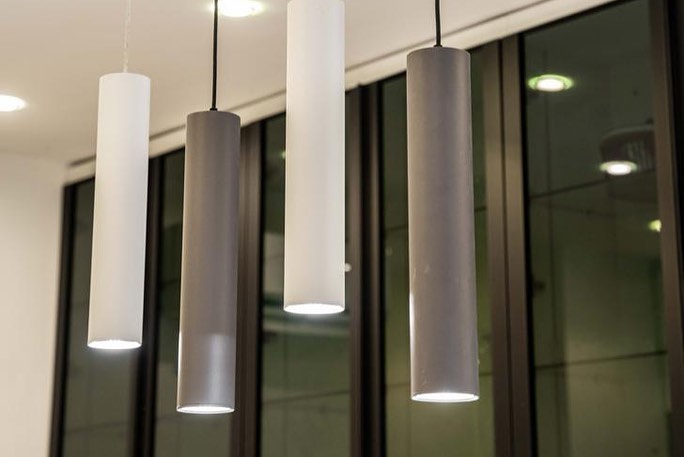 Drop down lights in Modern Galley Kitchen By HOA Interior