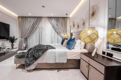 Sleeping area in Neoclassic master bedroom design by design by c. williams