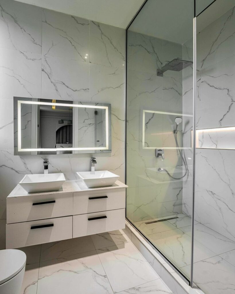Bathroom in the Pastel Green Bedroom by Michael Ehiz Design
