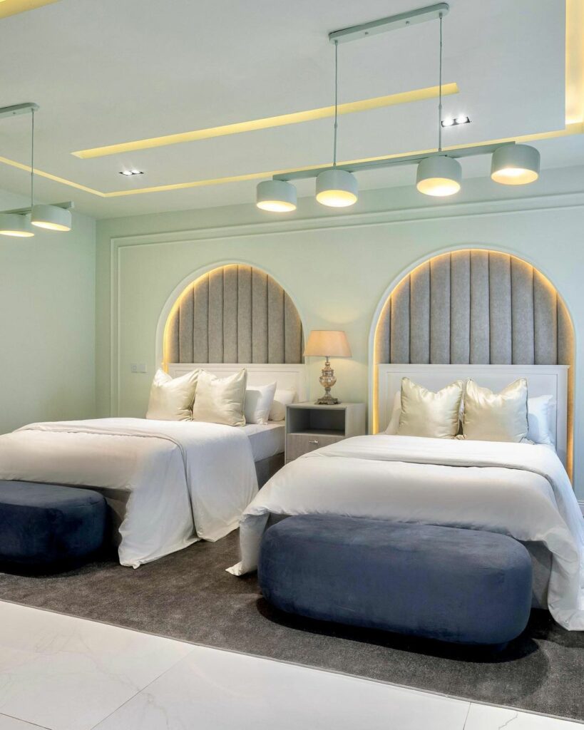 View of the Pastel Green Bedroom by Michael Ehiz Design