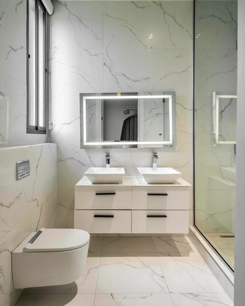 Bathroom in the Pastel Green Bedroom by Michael Ehiz Design