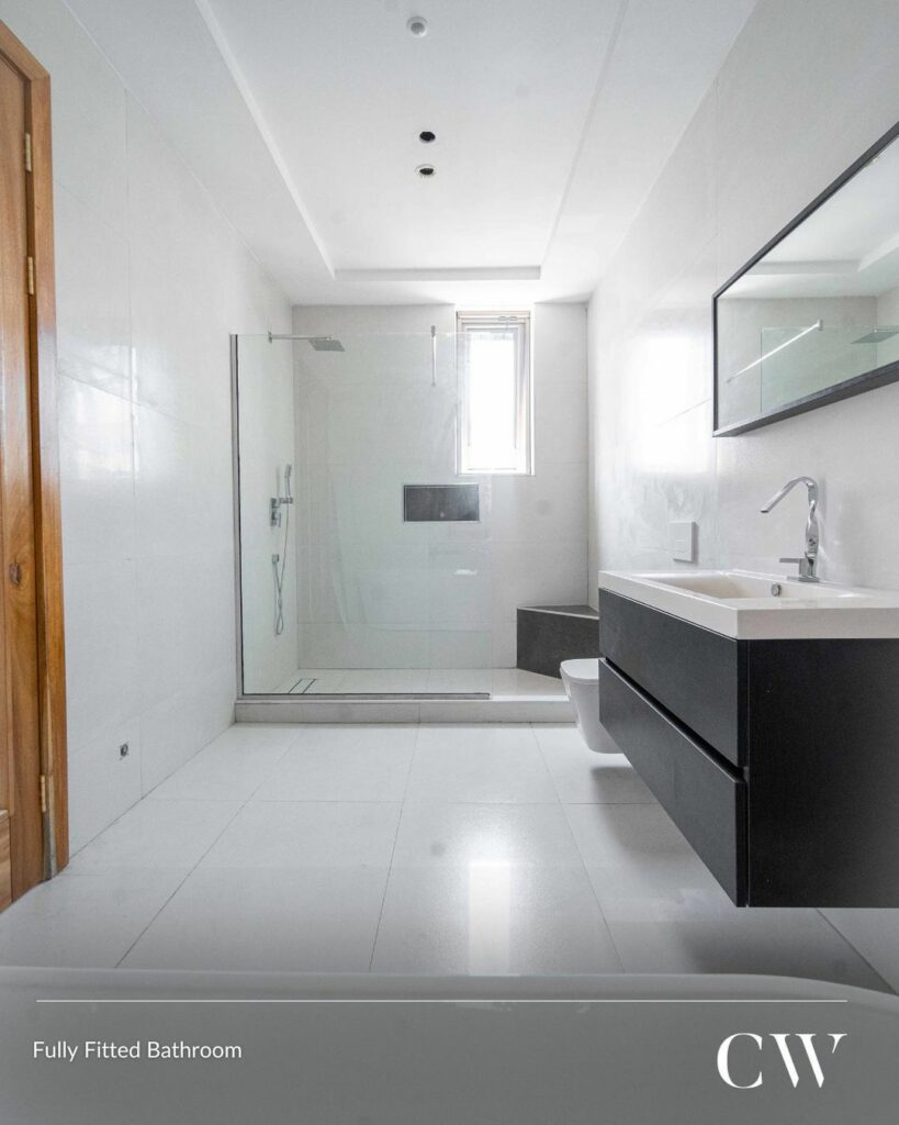 A bathroom in the 600 Million Naira 5-bedroom detached house By CW Real Estate