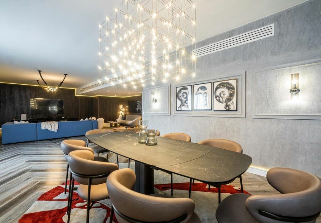 Dining area in Avant-Garde Living Room By ISD Studio