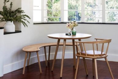 Curved Milk Bench By Houtlander with the Round Cafe Table and The Low Back Upholstered Dining chair