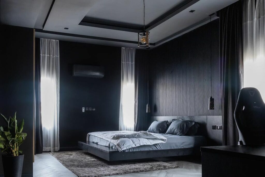 Bedroom in Dark-Themed Contemporary Home in Abuja By dhk Designs