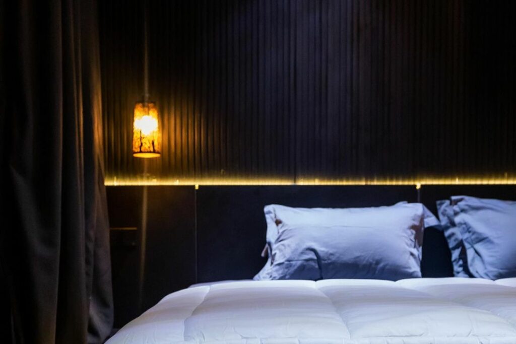 Bedroom in dark-Themed Contemporary Home By dhk Designs