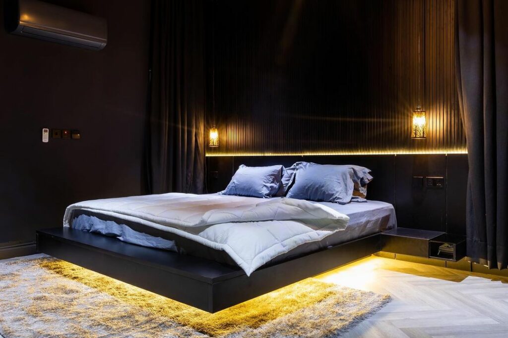 Bedroom in Dark-Themed Contemporary Home in Abuja By dhk Designs