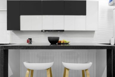 Island in Monochrome kitchen by oak and teak