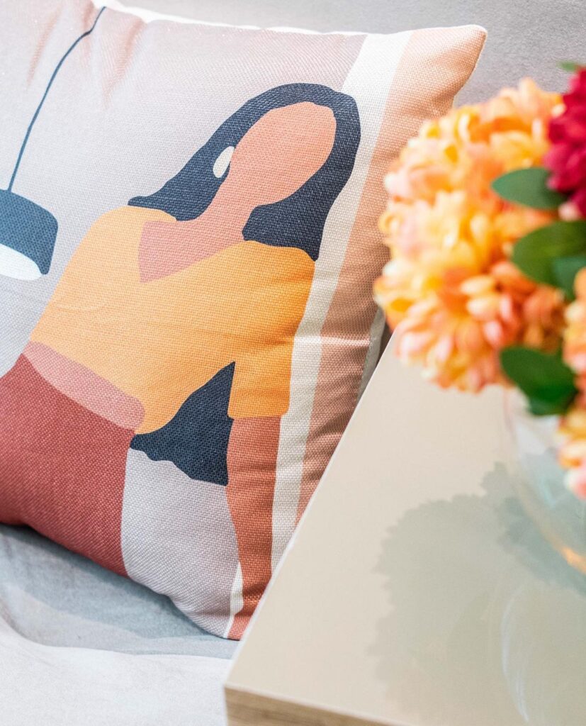 Throw pillow detail at the Scandi-style Bedroom By Interiors With Tega.