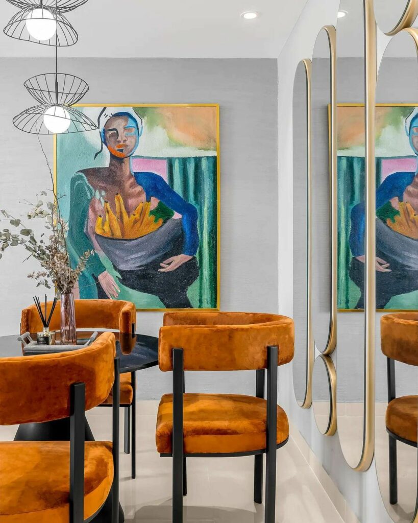 Dining area in Afrocentric Living Room By Jayvane Interiors