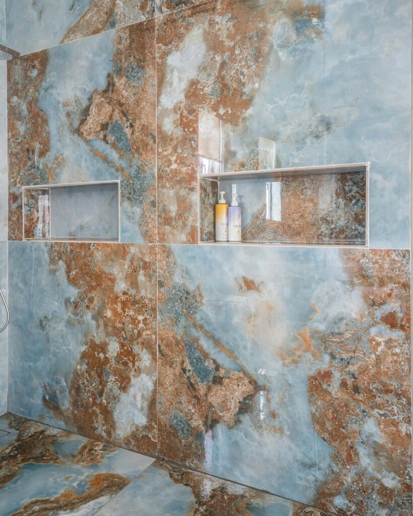 Shower area in Ocean Blue Bathroom By Serdamol Interiors