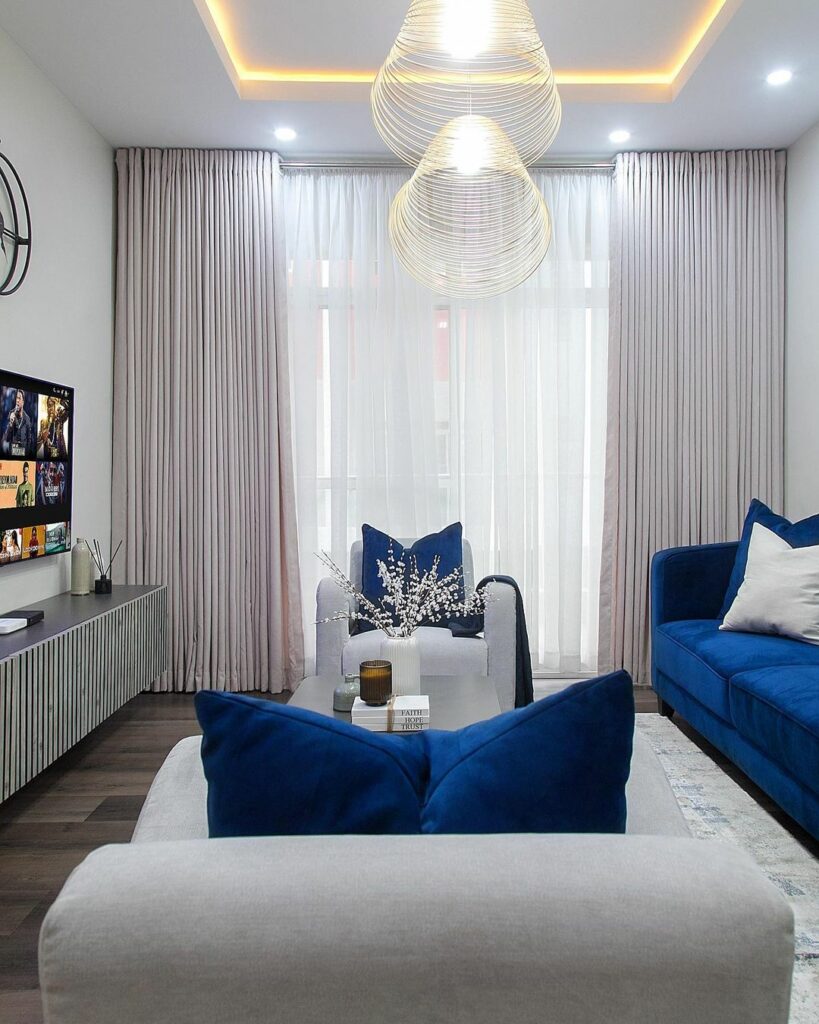 The family living room, one of the blue-themed living rooms in Project blue by Olivehaus Interiors