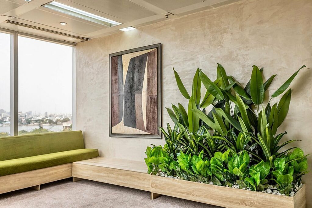Hybrid furniture showcases green shades with incorporated planter
