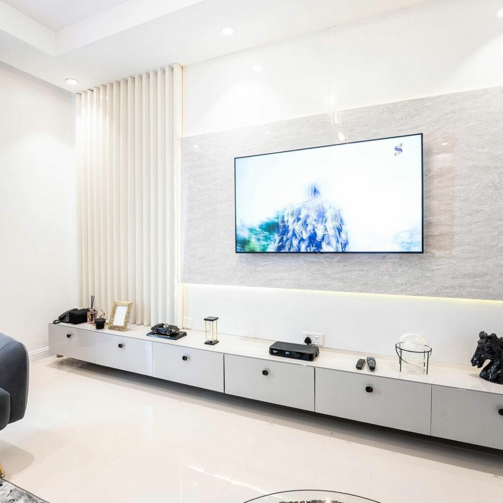 White TV Joinery in Living room design by Onnalush Interiors