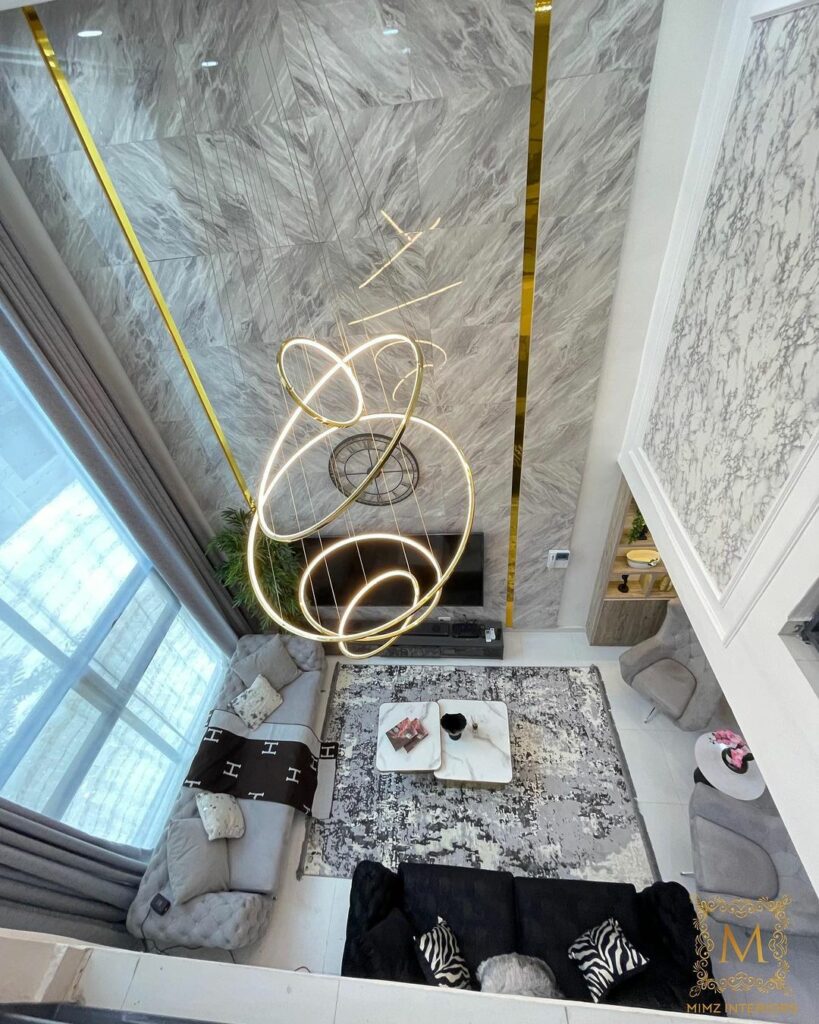 Aerial view of Living Room with gold accents by Mimz Interiors