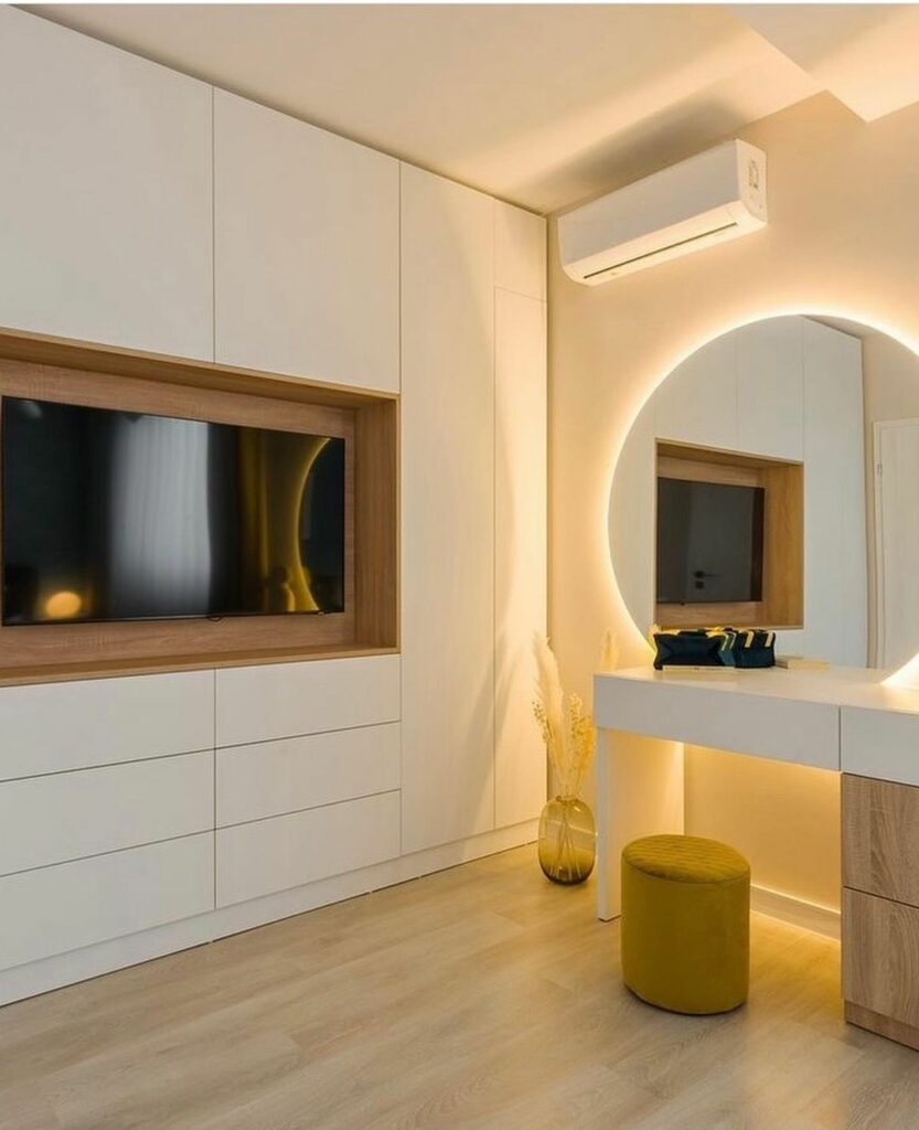 A view of the wardrobe and dresser in Modern Boy's Bedroom Design by Nigerian Interior design studio, Tesob Homes
