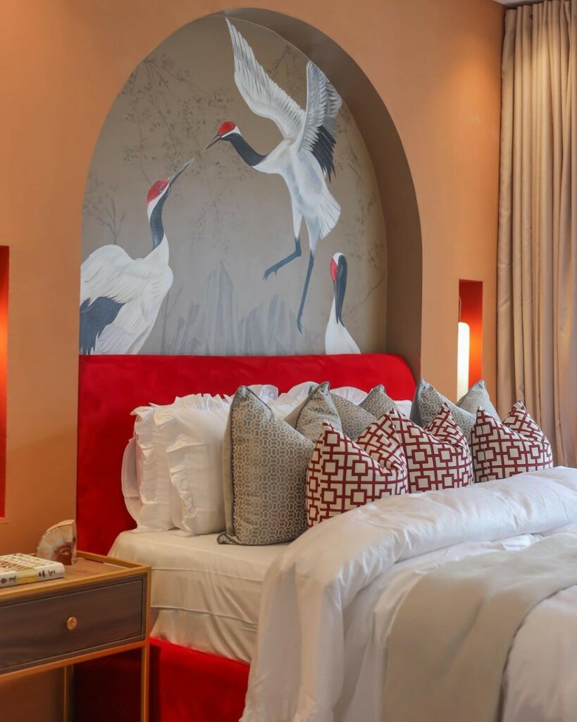 Warm master bedroom design with embedded bedframe.