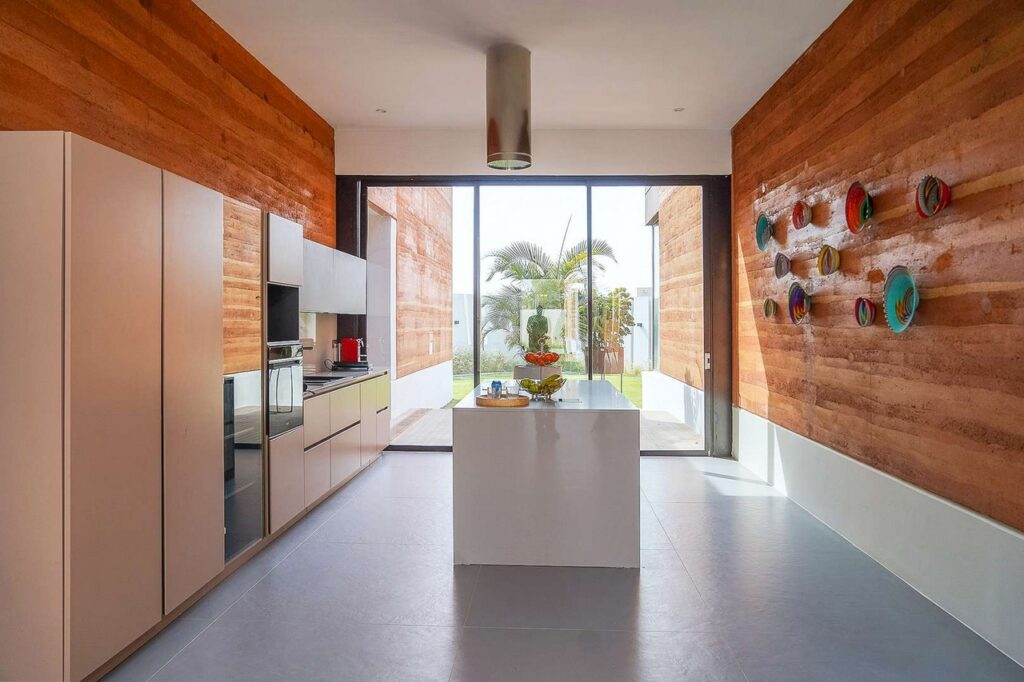 A view of the kitchen in the Ubikwiti House by Senegalese architecture studio ID+EA.