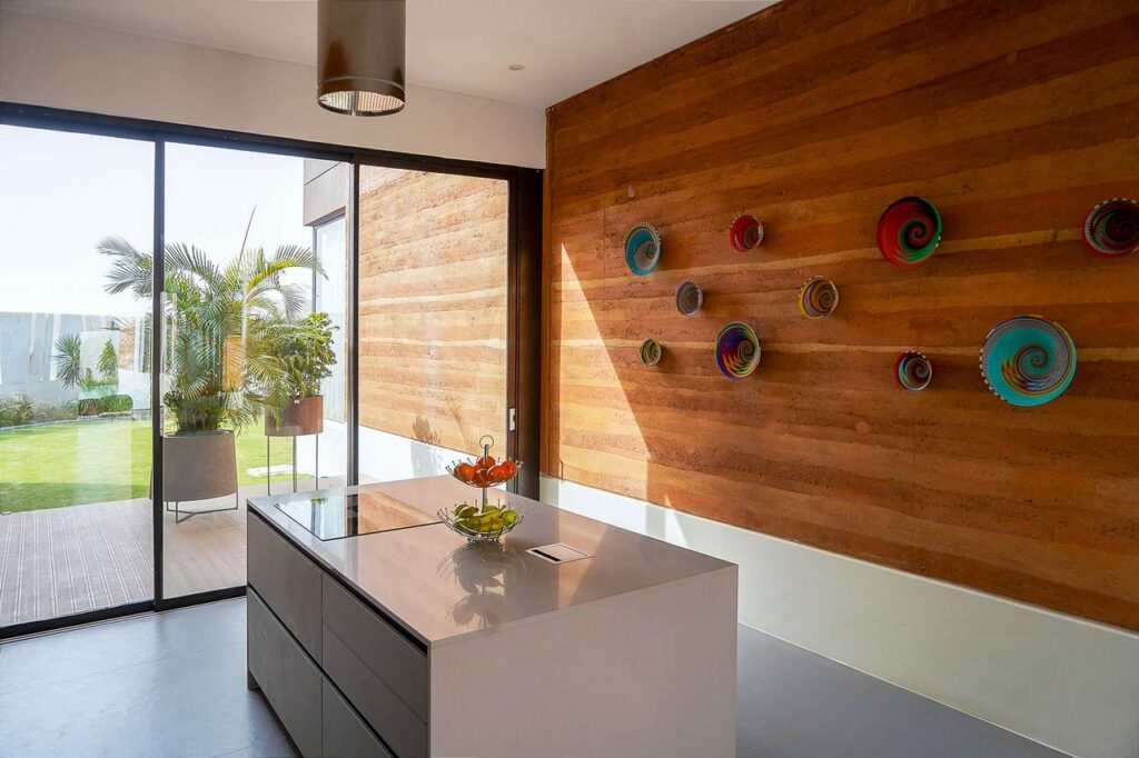A view of the kitchen in the Ubikwiti House by Senegalese architecture studio ID+EA.