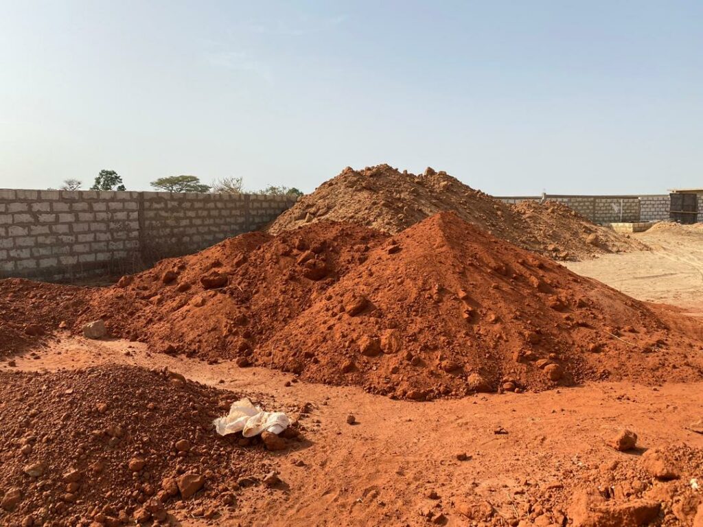 Red sand for rammed earth construction 
