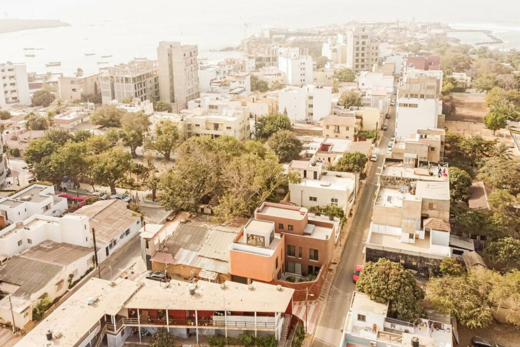 Lessons in Tropical Modern Architecture from an Earthy Villa in Senegal by MOST Monti Studio