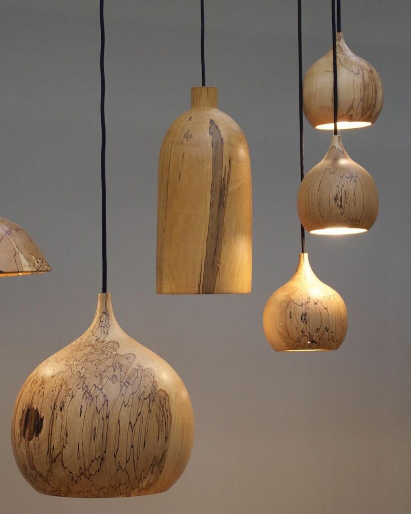 Afrocentric wooden pendant lights by Wodu Lightings
