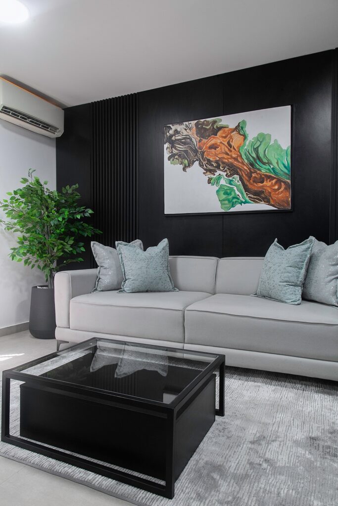 Light grey sofa in Contemporary Office In Lagos By La Maison Douillet