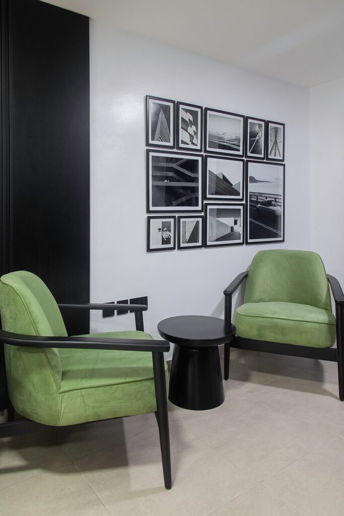 Green accent chairs arranged conversation style.