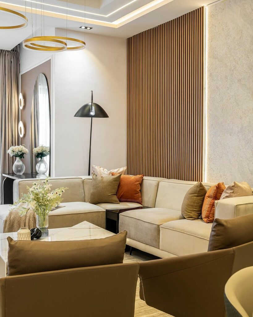 Warm living room design by Goldray Interior