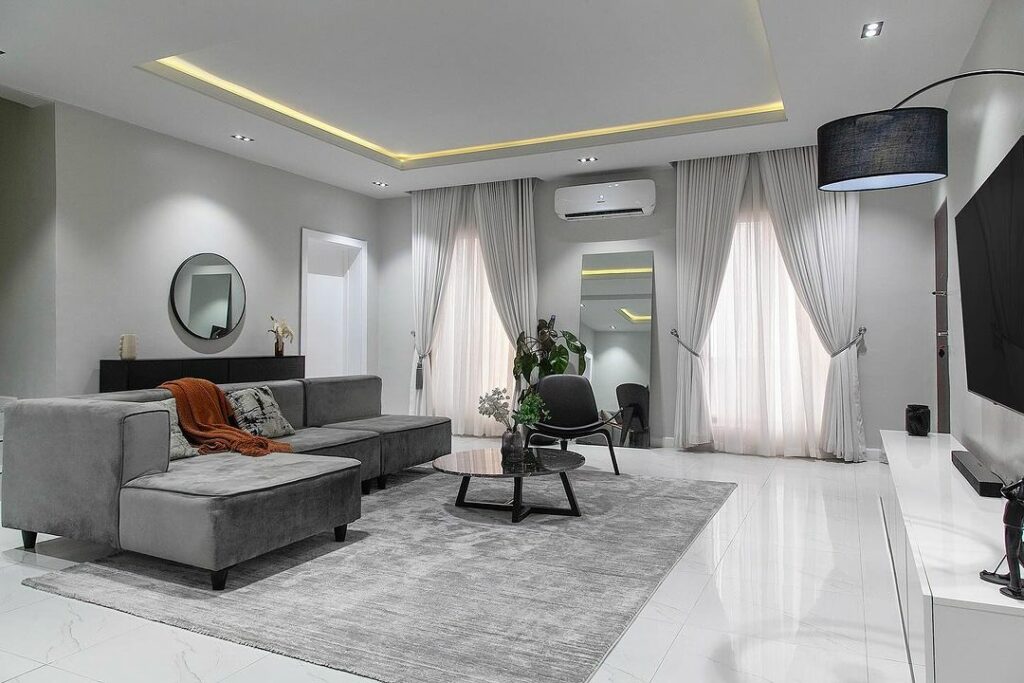 Gray Monochromatic living room by Mandora Design