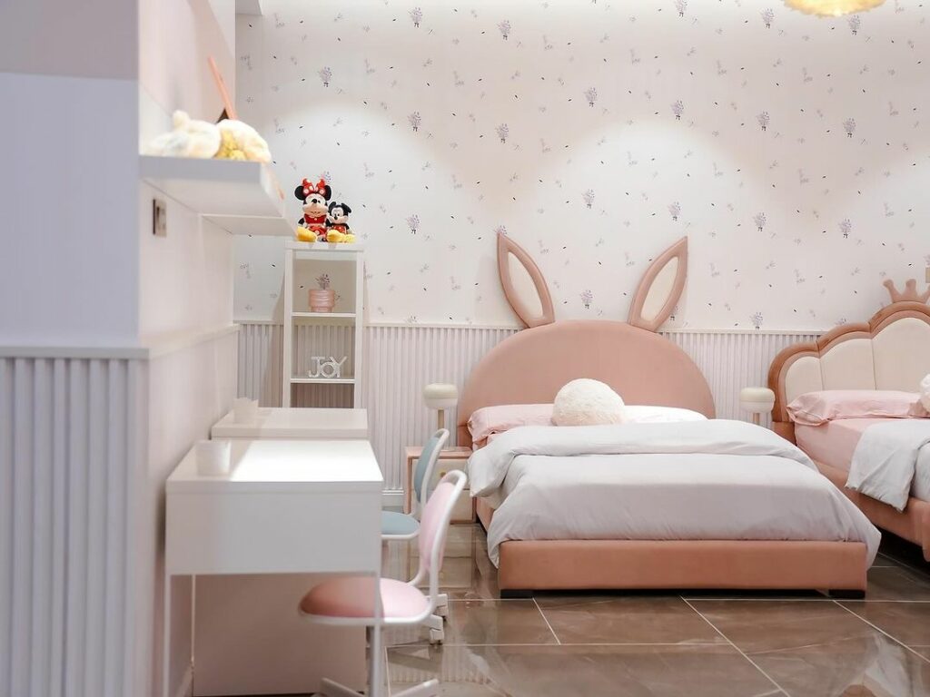 Chic wallpaper in bedroom for two little girls by Greyson Living.