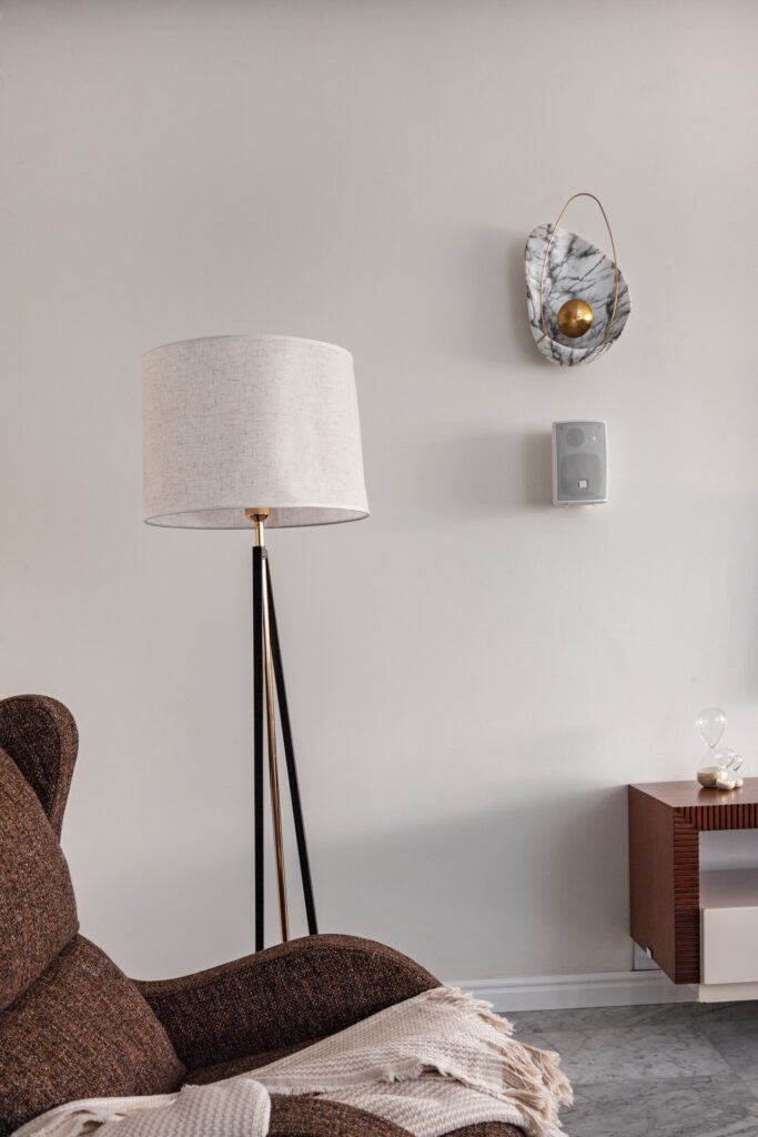 Close up view of floor lamp in a modern living room.