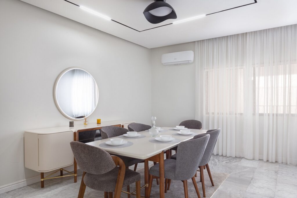 Dining area in Snow Queen, a luxury contemporary short-let apartment by Checkers Bnb.